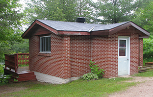 small brick cabin